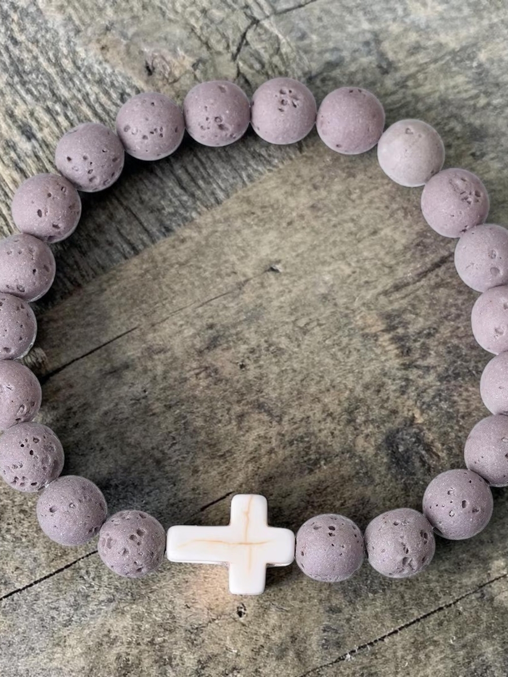 Gray Lava Bead Bracelet with White Cross Accent